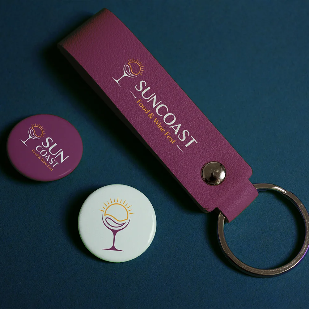Suncoast Food and Wine Festival branded keychain and pins merchandise