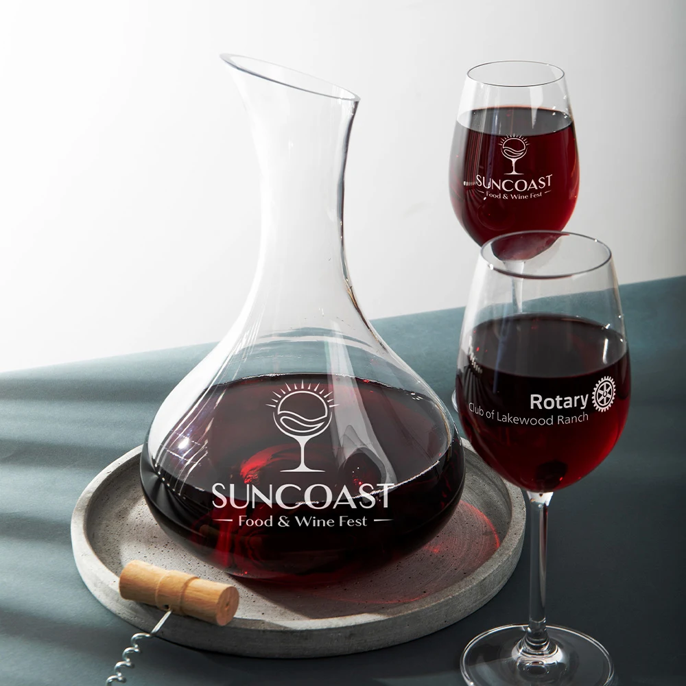Suncoast Food & Wine Fest official branded wine decanter and glasses set filled with red wine