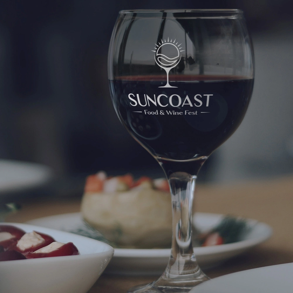 Suncoast Food & Wine Fest official branded tasting glass featuring red wine